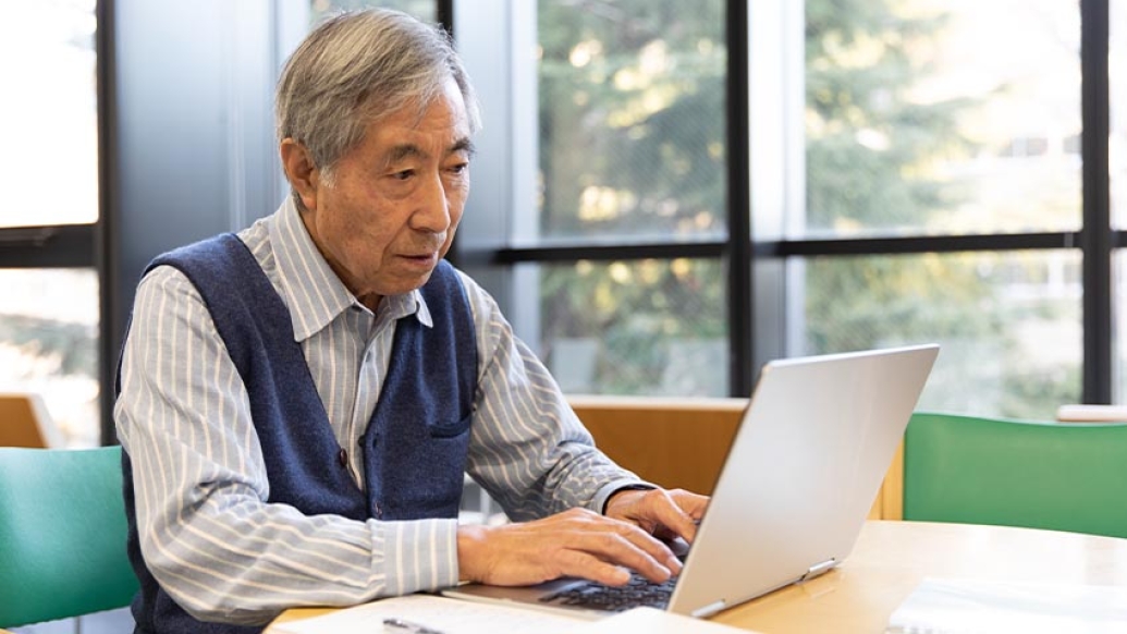 Older gentleman on computer